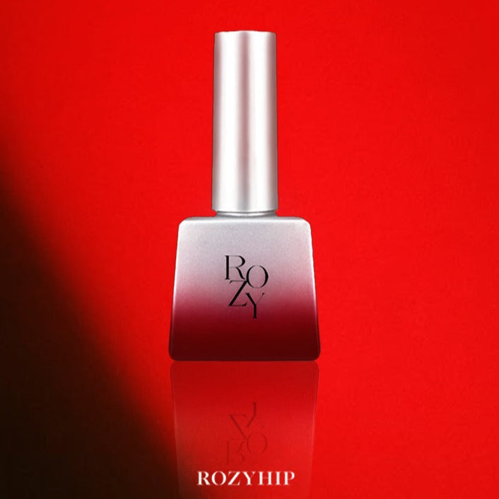 Red nail polish bottle with 'Red Fever' branding on a red background