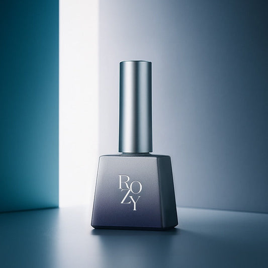 Nail polish bottle with 'ROZY' branding on a gradient blue background