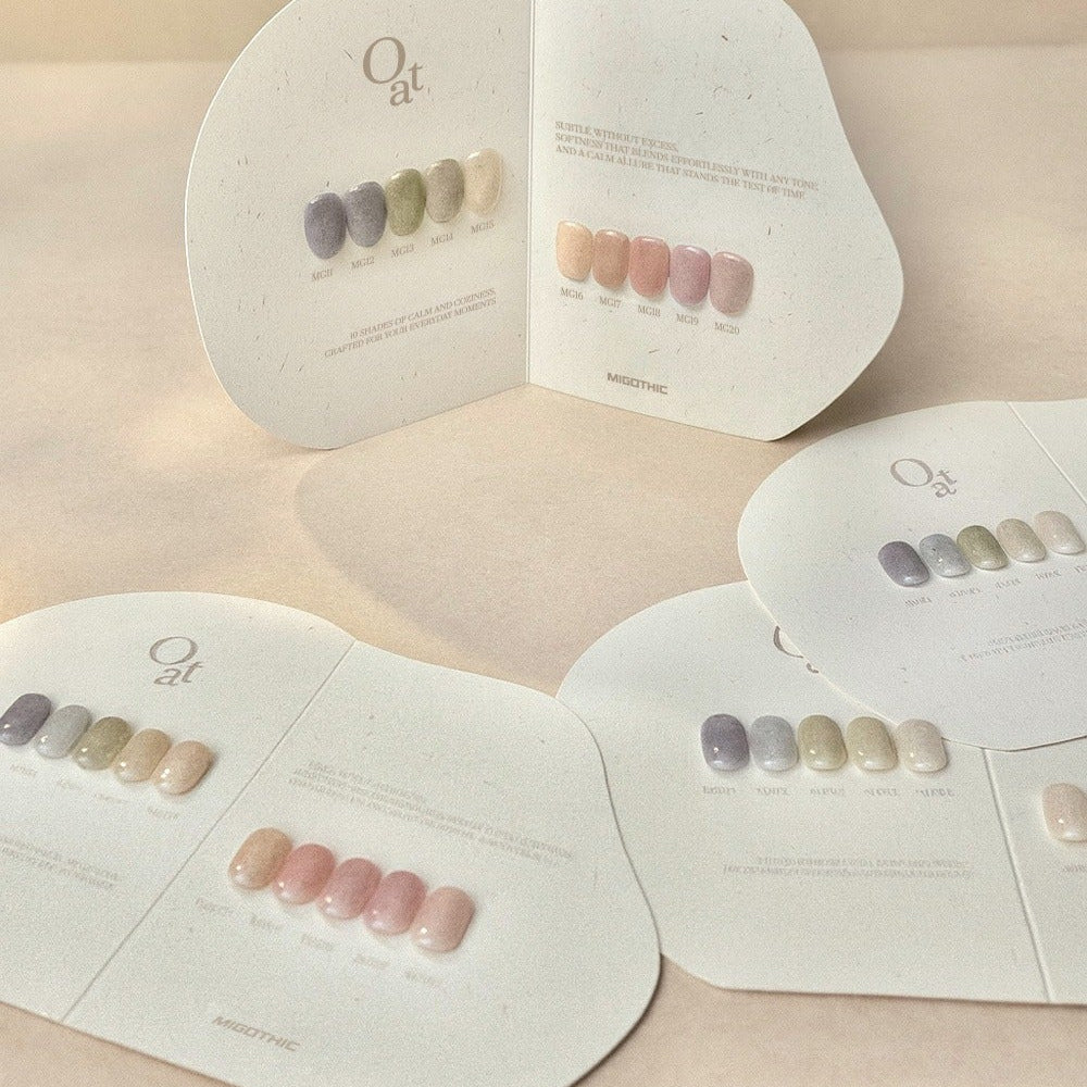 Set of nail polish bottles with a color swatch card on a neutral background