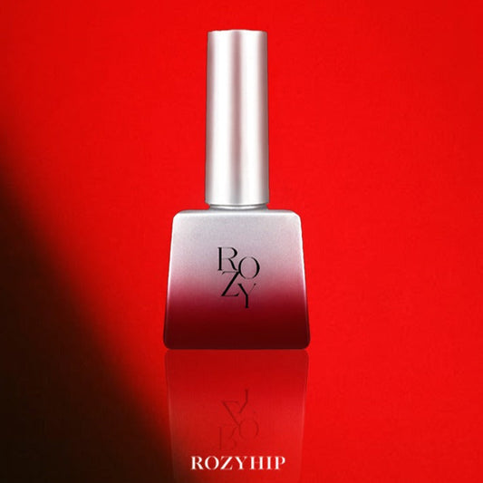 Red nail polish bottle with 'Red Fever' branding on a red background