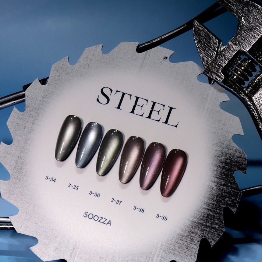 Saw blade with 'STEEL' and 'SOOZZA' text, featuring metallic nail polish colors on a blue background.