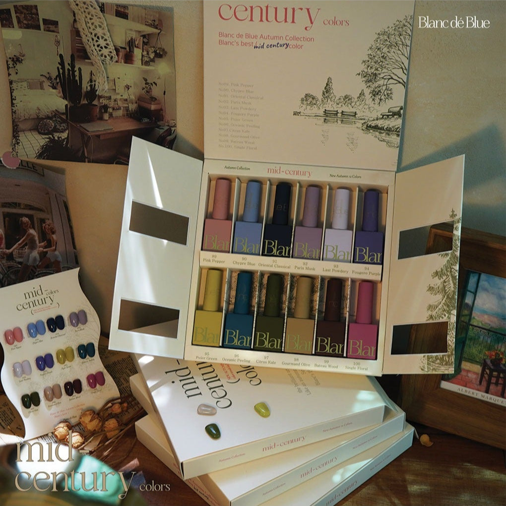 Nail polish set with color swatches and packaging on a surface